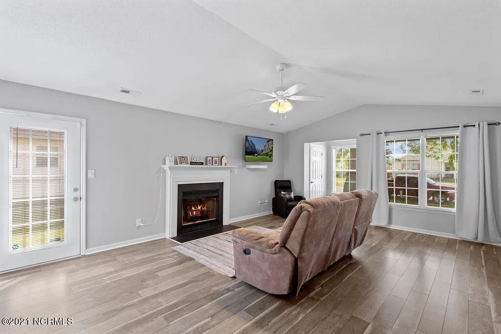 Renovated living room of the Raspberry Court home in Hubert, NC